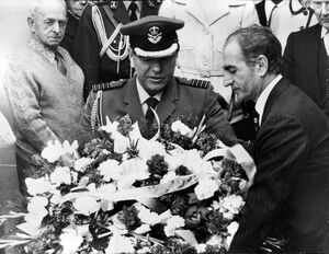 ShahanshahLayingWreathWarMemorial CanberraMehr1353a.jpg